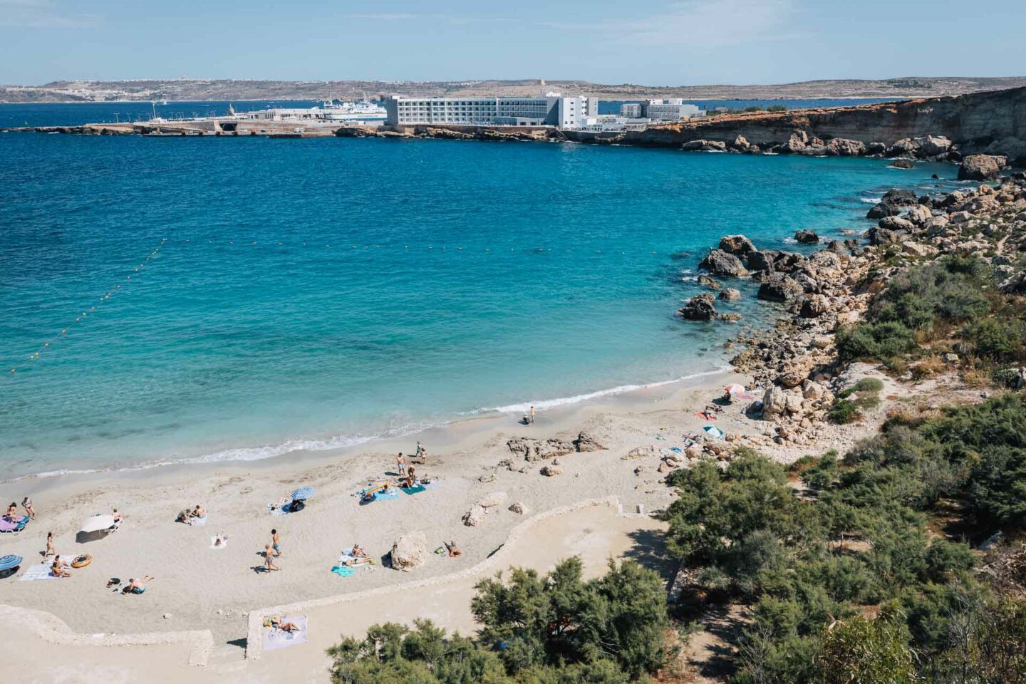 paradise bay beach, paradise bay beach malta, malta paradise bay beach, paradise bay malta beach, the beach at paradise bay, paradise bay malta